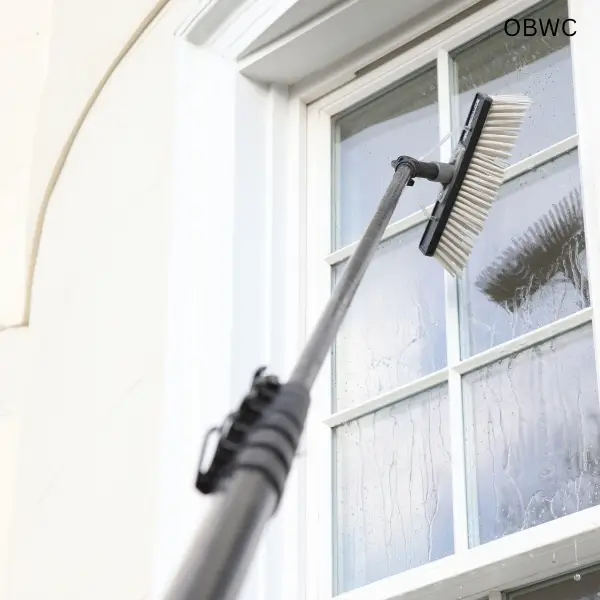 Water fed pole close up near window