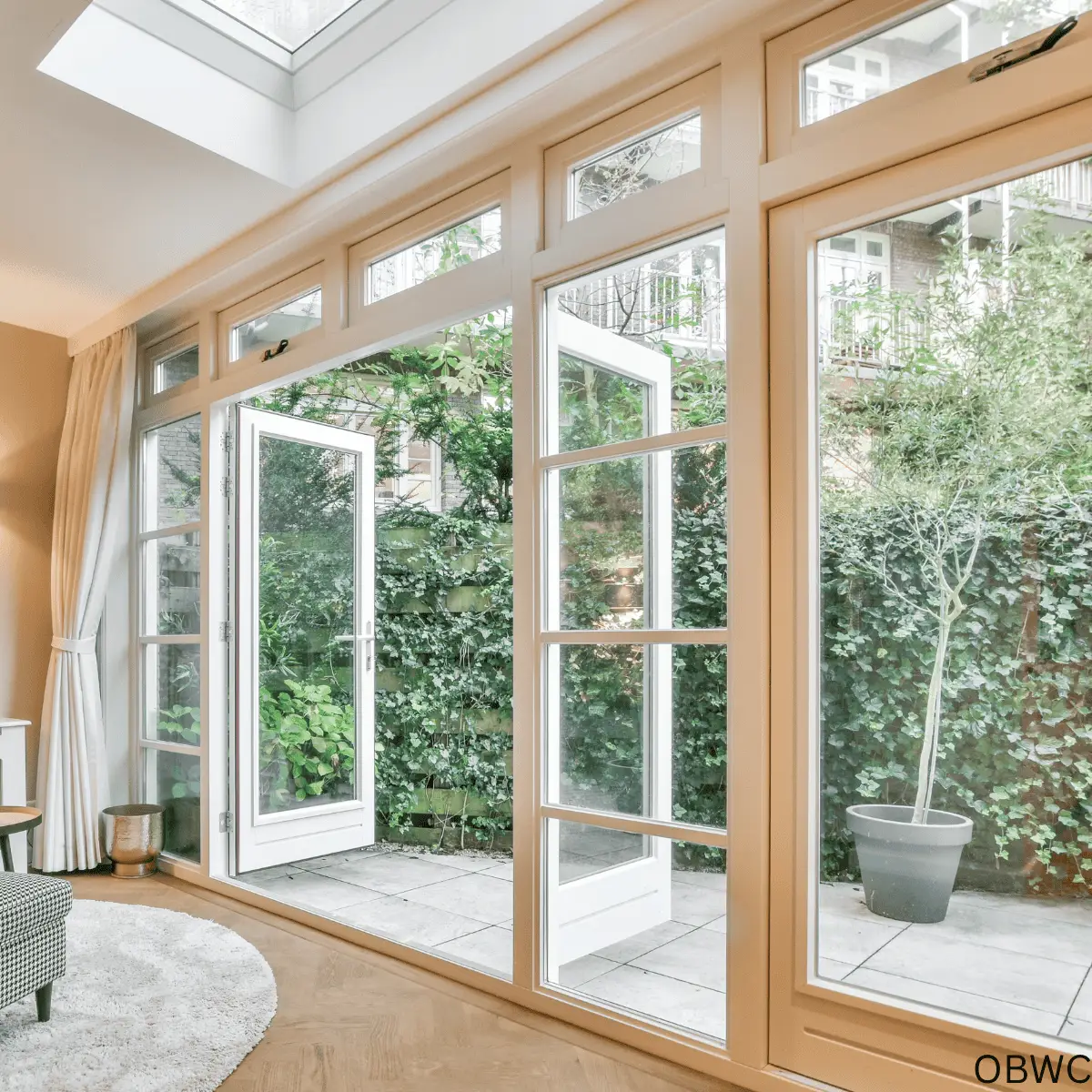 Ocean Breeze Window Cleaning sparkling windows leading out to a lovely courtyard