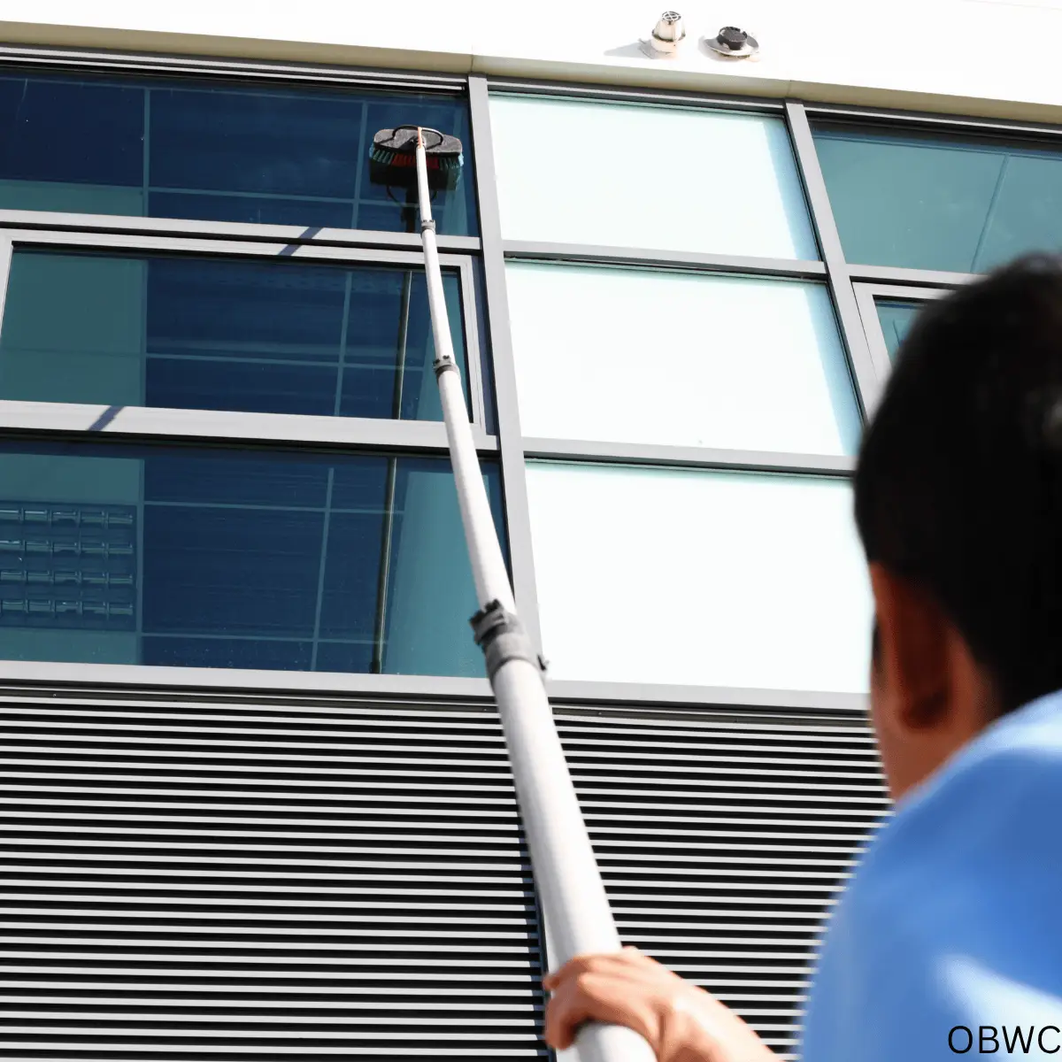 Ocean Breeze Window Cleaning I cleaning office windows to make them shine