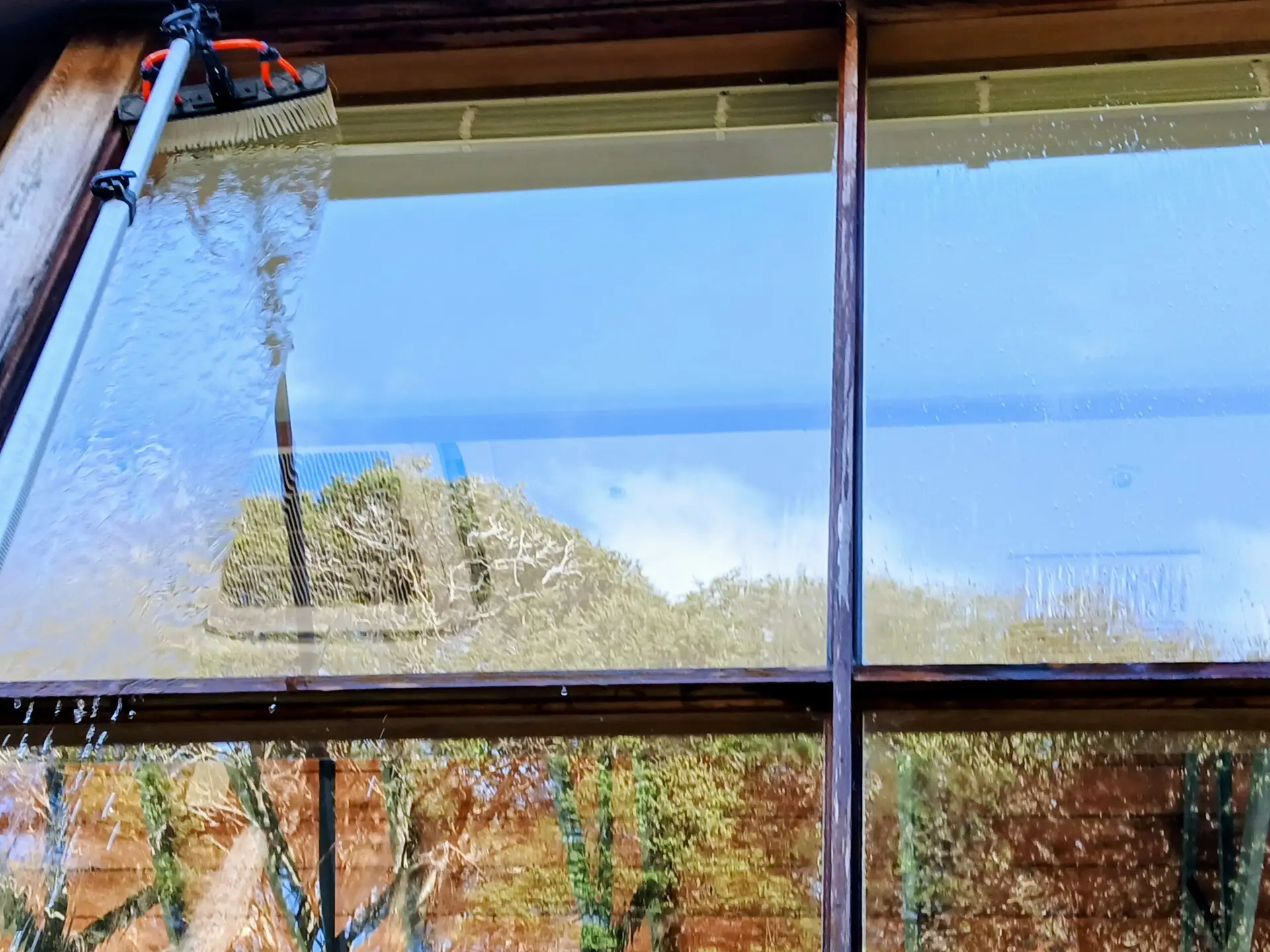 water fed pole cleaning high window